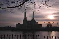 Battersea from the other side of the Thames with the sunset in the background